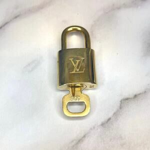 Authentic Louis Vuitton Brass Lock & Key Set - #306